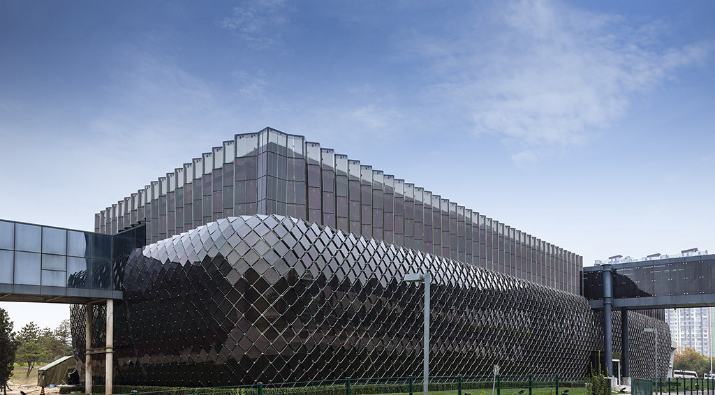 Figure 3 - A new BIPV facade at Hanergy HQ in Beijing, China. This facade, designed to resemble dragon scales, generates about 20% of the total energy used by the building.